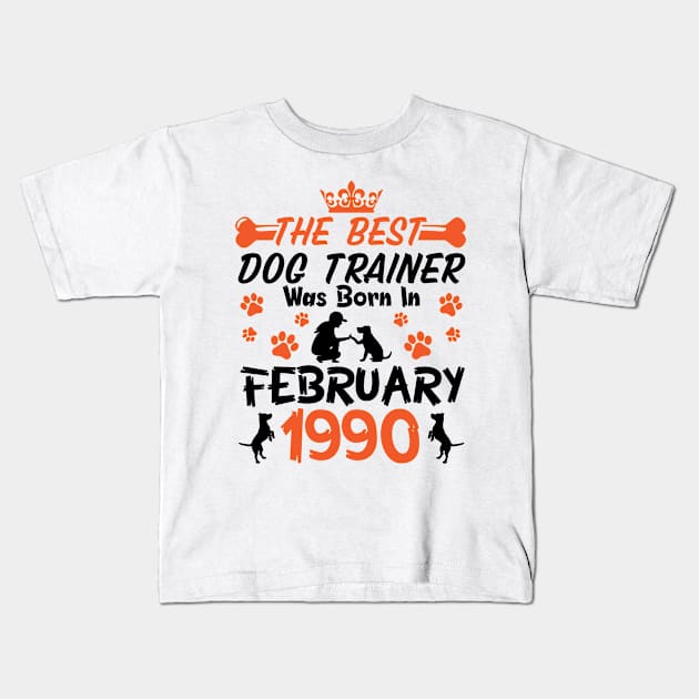 The Best Dog Trainer Was Born In February 1990 Happy Birthday Dog Mother Father 31 Years Old Kids T-Shirt by Cowan79